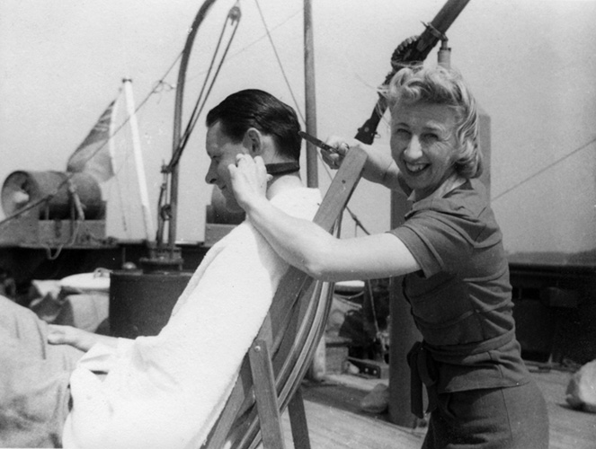 Lady cutting Genteleman's hair aboard RN ship?