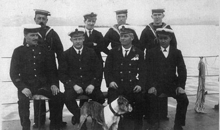 The Petty Officers and ship's mascot on M18