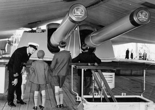 Greg Clark with young visitors to HMS Vanguard