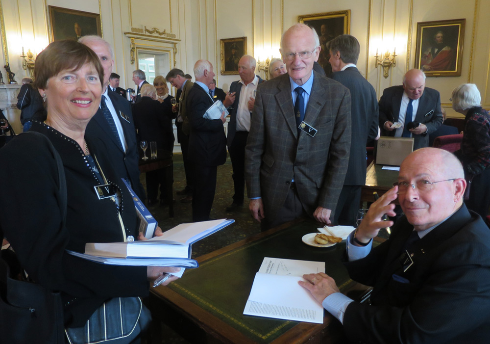 John Rodgaard signing books at the launch of A Hard Fought Ship