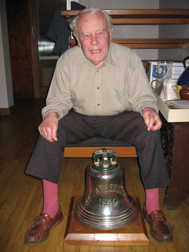 Stephen Barney and the bell of HMS Athelsone