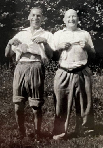 Searle Badman in the family orchard, Street, with his cousin
